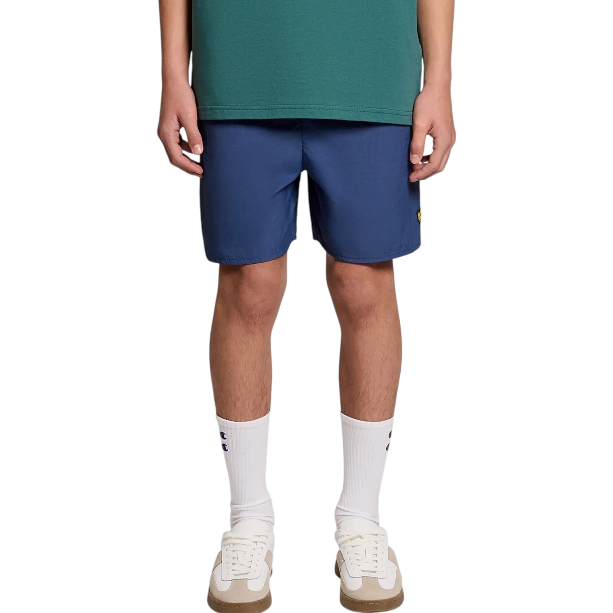 Lyle & Scott blue swim shorts with rubberised logo, front view