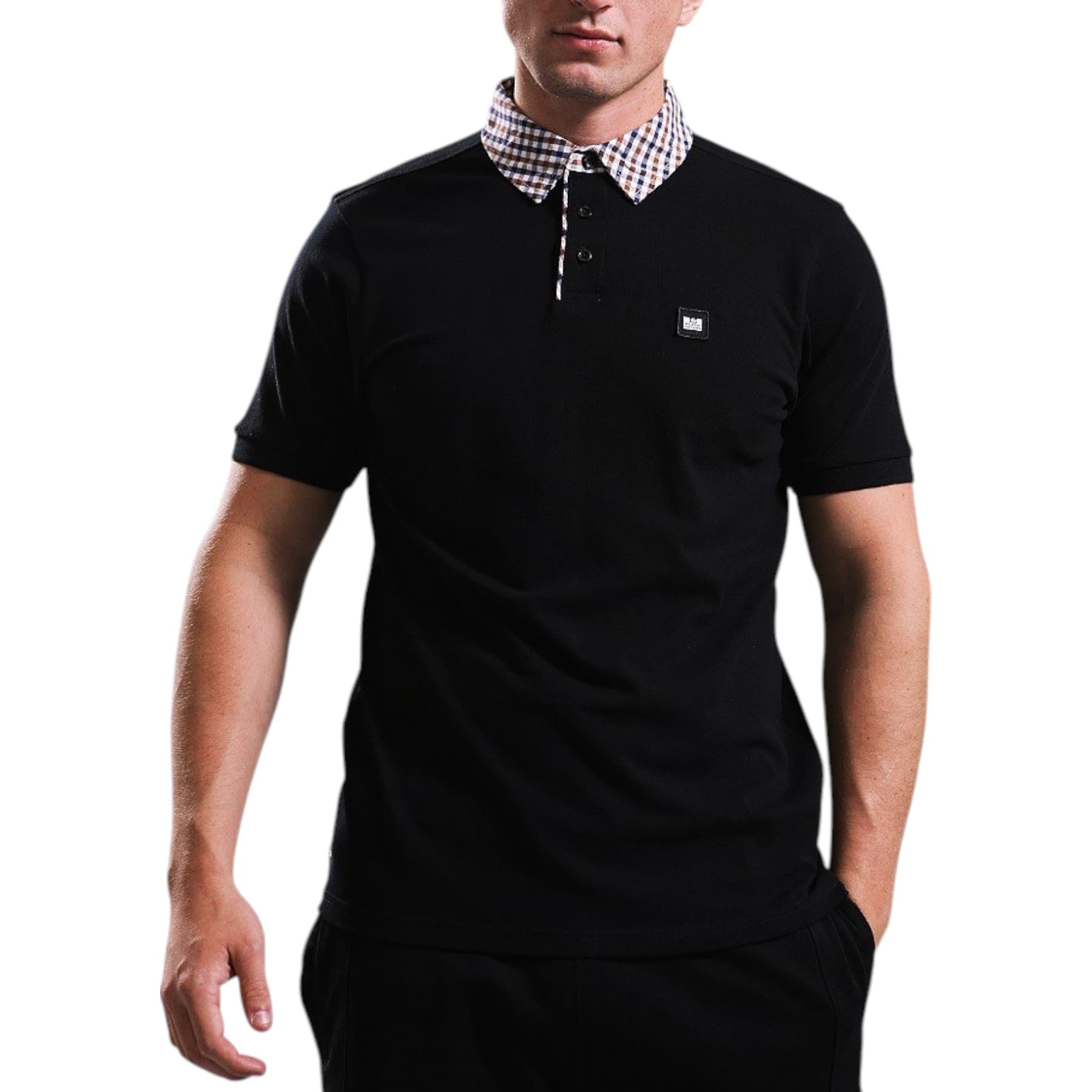 Weekend Offender black cotton pique polo shirt front view with WO badge