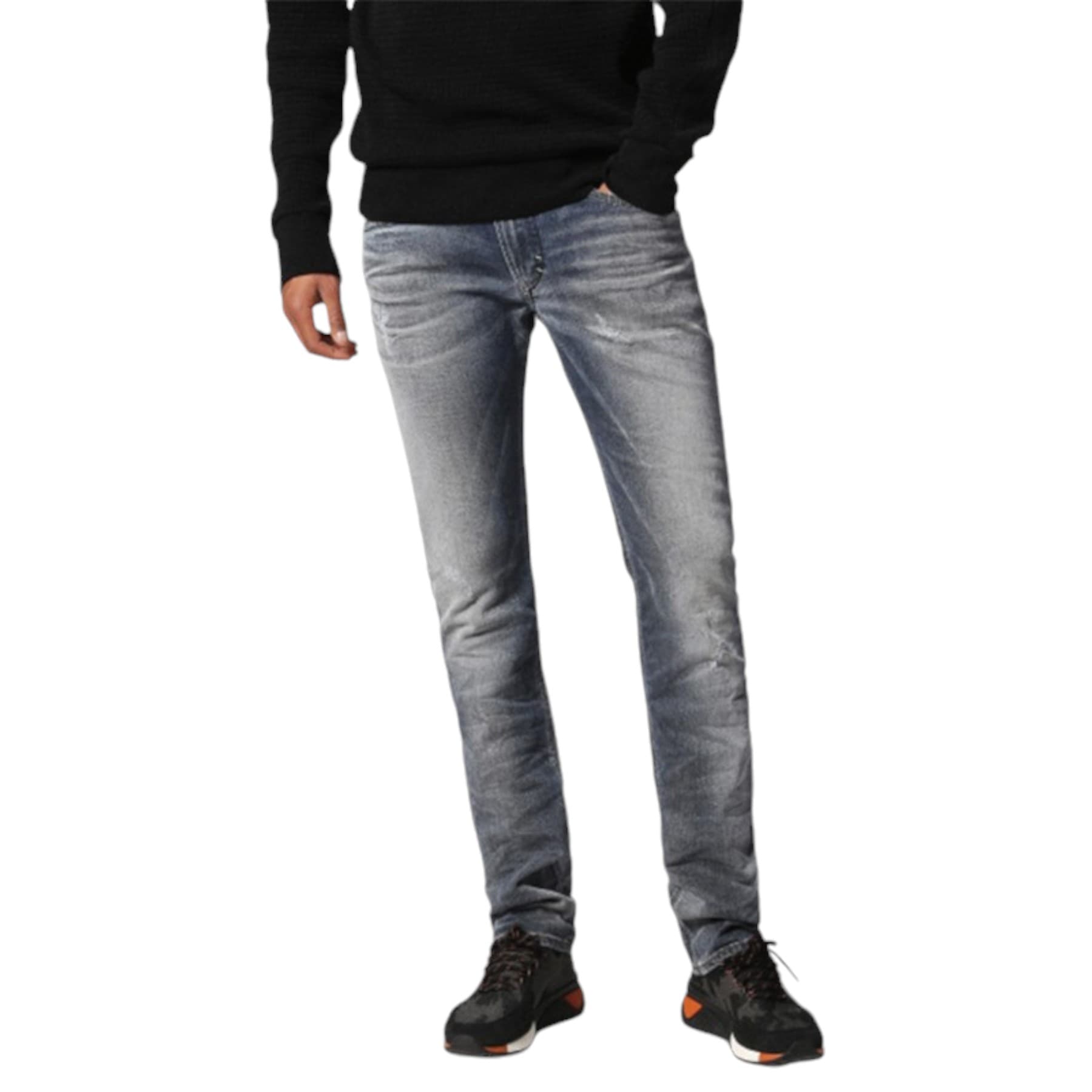 Diesel THAVAR 084IK men's distressed denim jeans front view